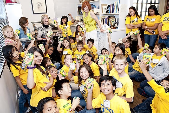 joni and grace kids holding up gospel bracelets
