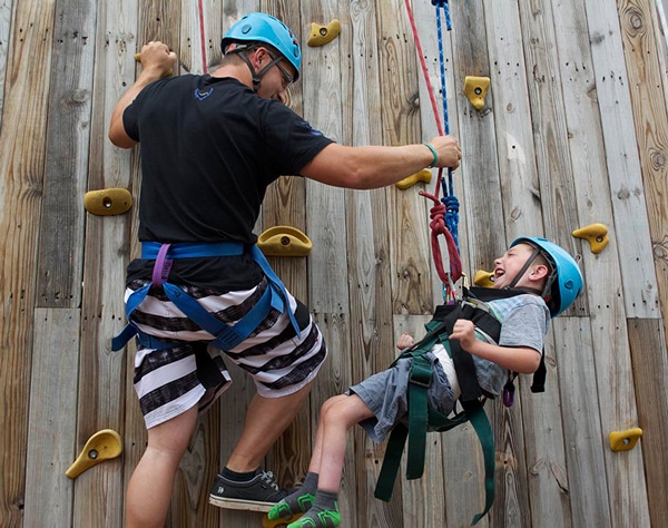 Emeric on the climbing wall Emeric on the climbing wall