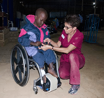 Thank you for Giving the Greatest Gift — God’s Word! Julius receiving his wheelchair from Wheels for the World