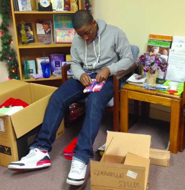 Cameron wrapping Christmas presents 