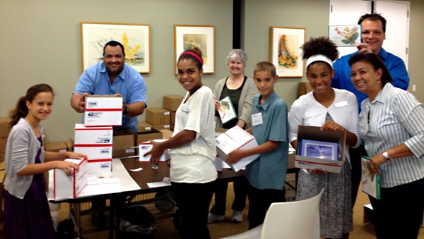group of joni and friends volunteers shipping out christmas cards