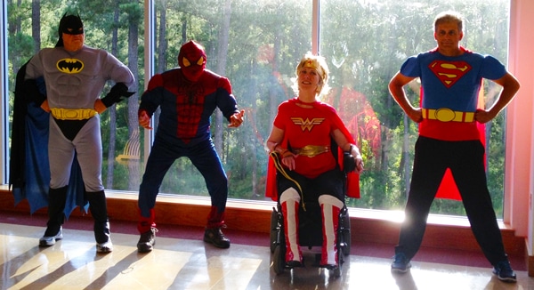 Superhero Night Joni and Friends executives dressed as superheros