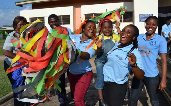 volunteers greeting families at Family Retreat volunteers greeting families at Family Retreat