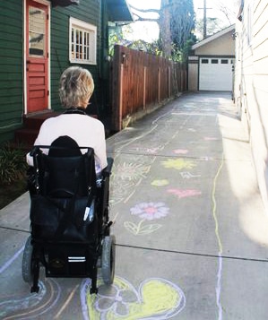 Joni's Joy Ride Joni wheeling down the path