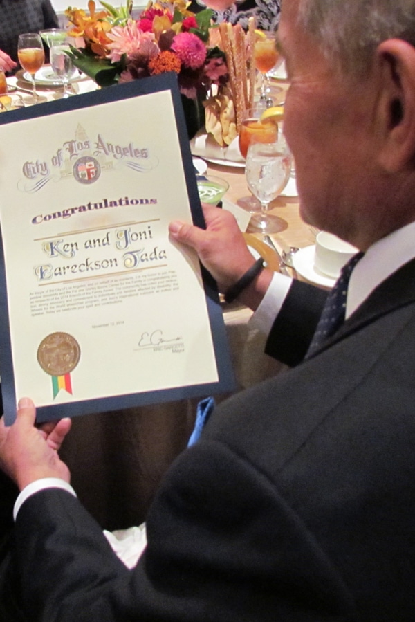 Ken holding award Ken holding award