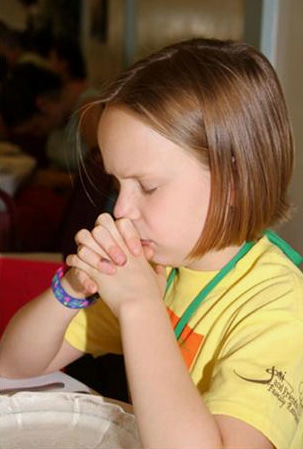 Joni and Friends staff praying Joni and Friends staff praying