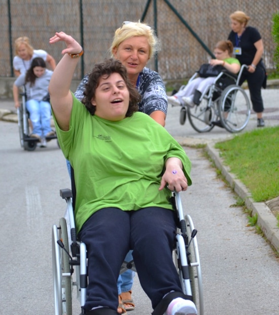Wheelchair user having fun at International Family Retreat Serbia Wheelchair user having fun at International Family Retreat Serbia