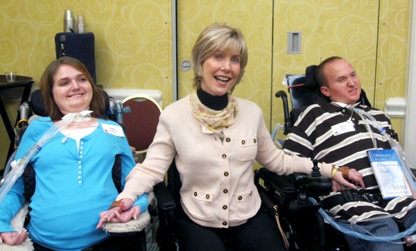 joni holding hands with tyson and paige