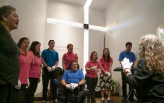 A choir sings in the chapel at the Joni and Friends International Disability Center