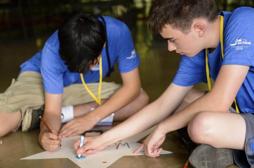 A volunteer and camper at Family Retreat