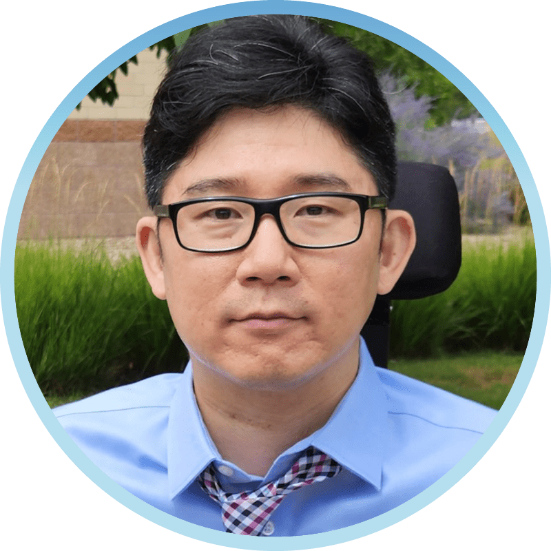 A headshot of J.D. Kim smiling at the camera.