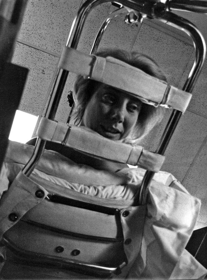Joni positioned face down on a Stryker frame to prevent pressure sores.