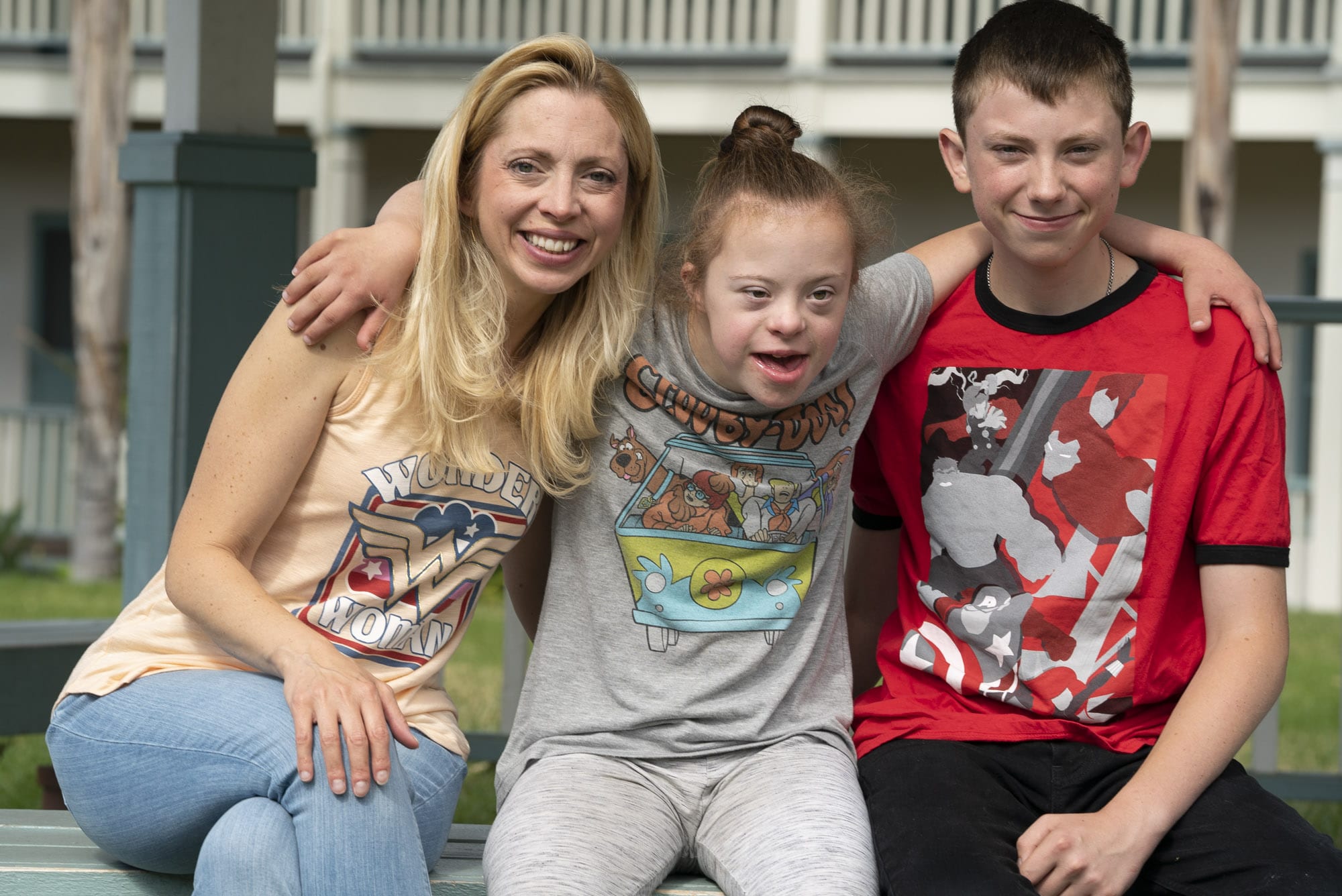 A picture of Shauna Amick with her daughter, Sarah, who has down syndrome and her young son.
