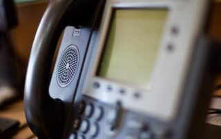 Close up of a landline phone for an office.