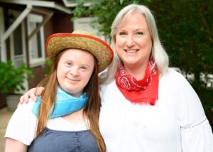 A mother and daughter wearing cowboy outfits at Family Retreat