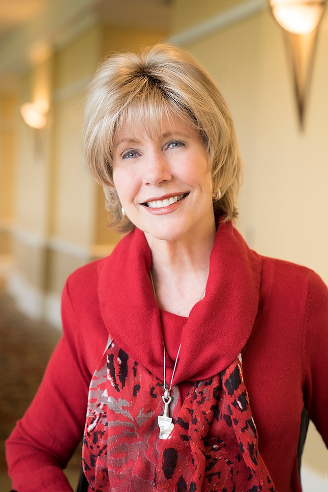 Joni Eareckson Tada smiling for the camera. 
