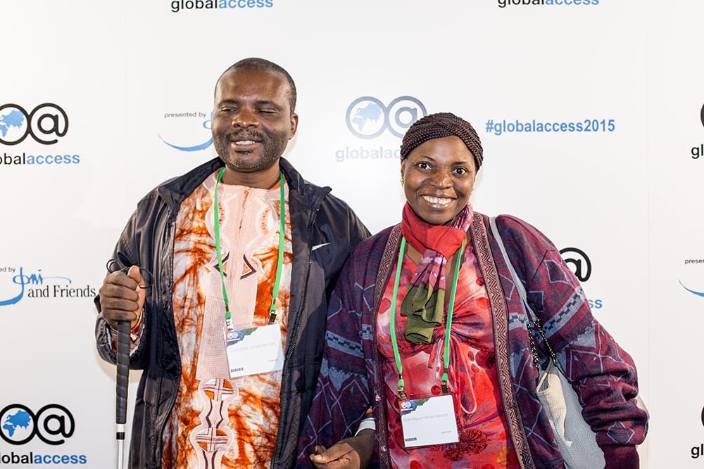 A man and woman at Global Access conference