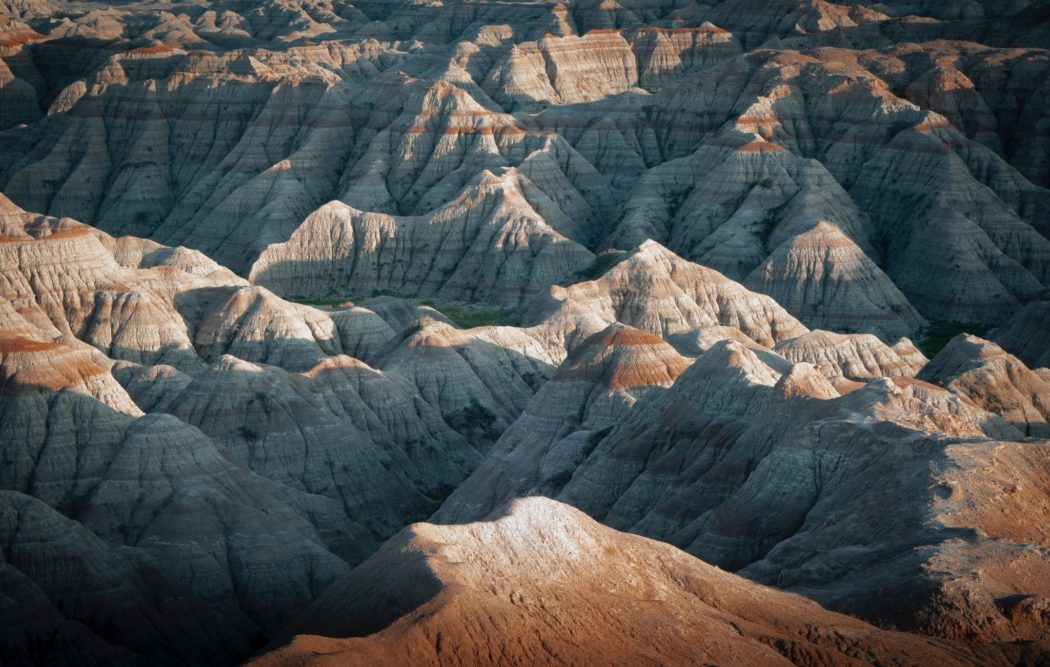 A view from above a rocky, jagged mountain range.