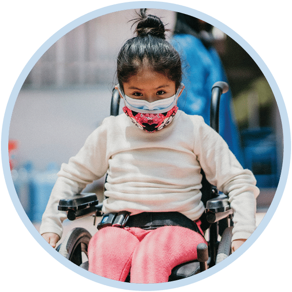 A girl in her new wheelchair
