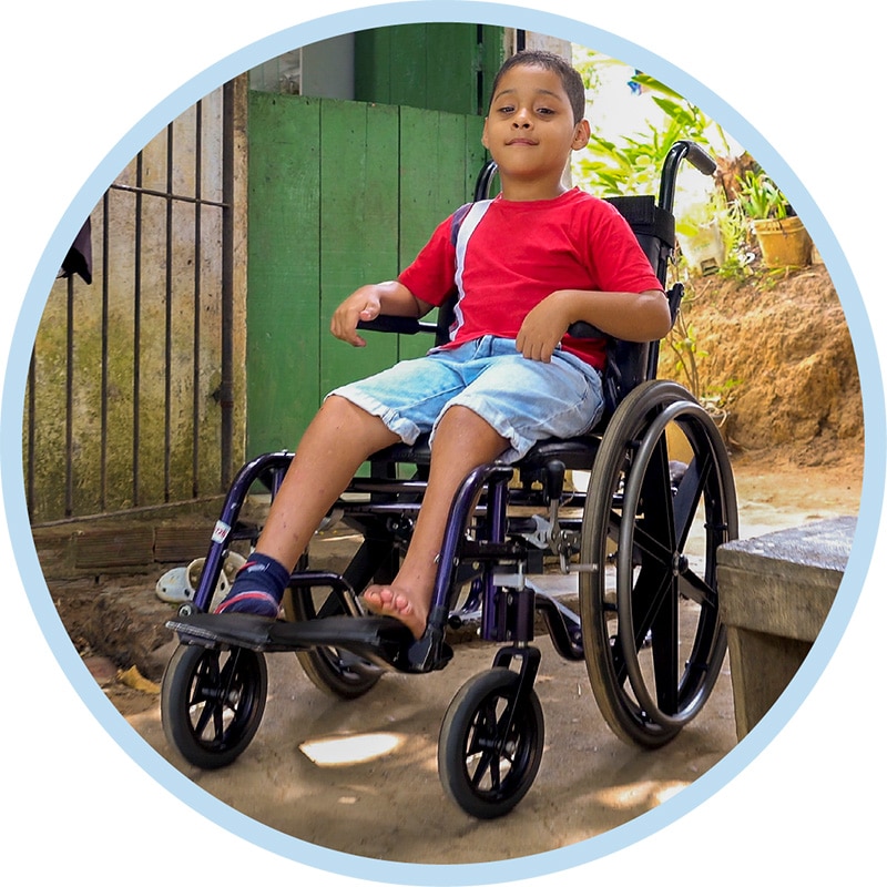 Miguel in his new wheelchair