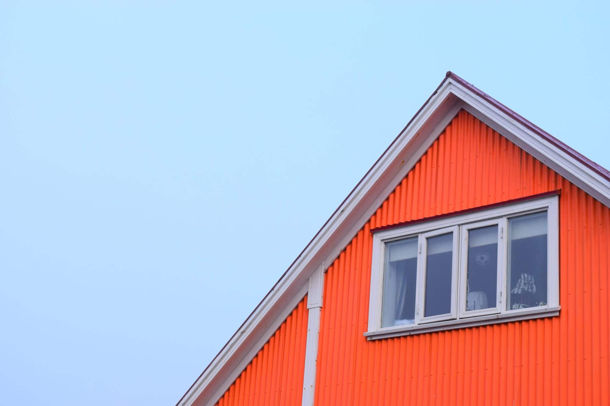 Close up of the roof of an orange house.