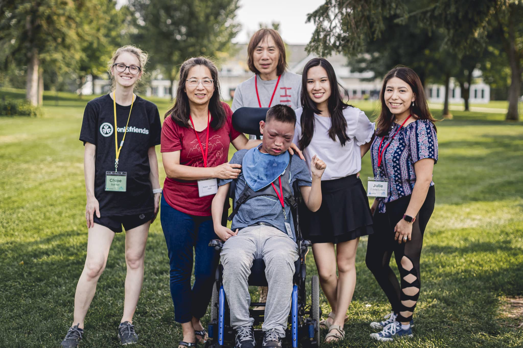 A family photo of Sandy, Joe, Dillion and their daughters Julie and Alisha and Dillion's Joni and Friends buddy, Chloe.
