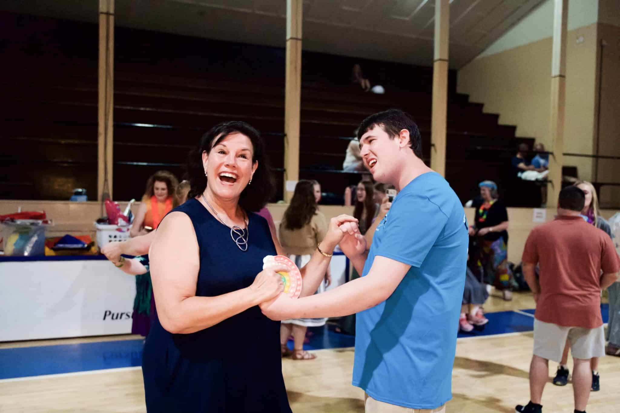 Janet and John Paul dancing at the camp Luau.
