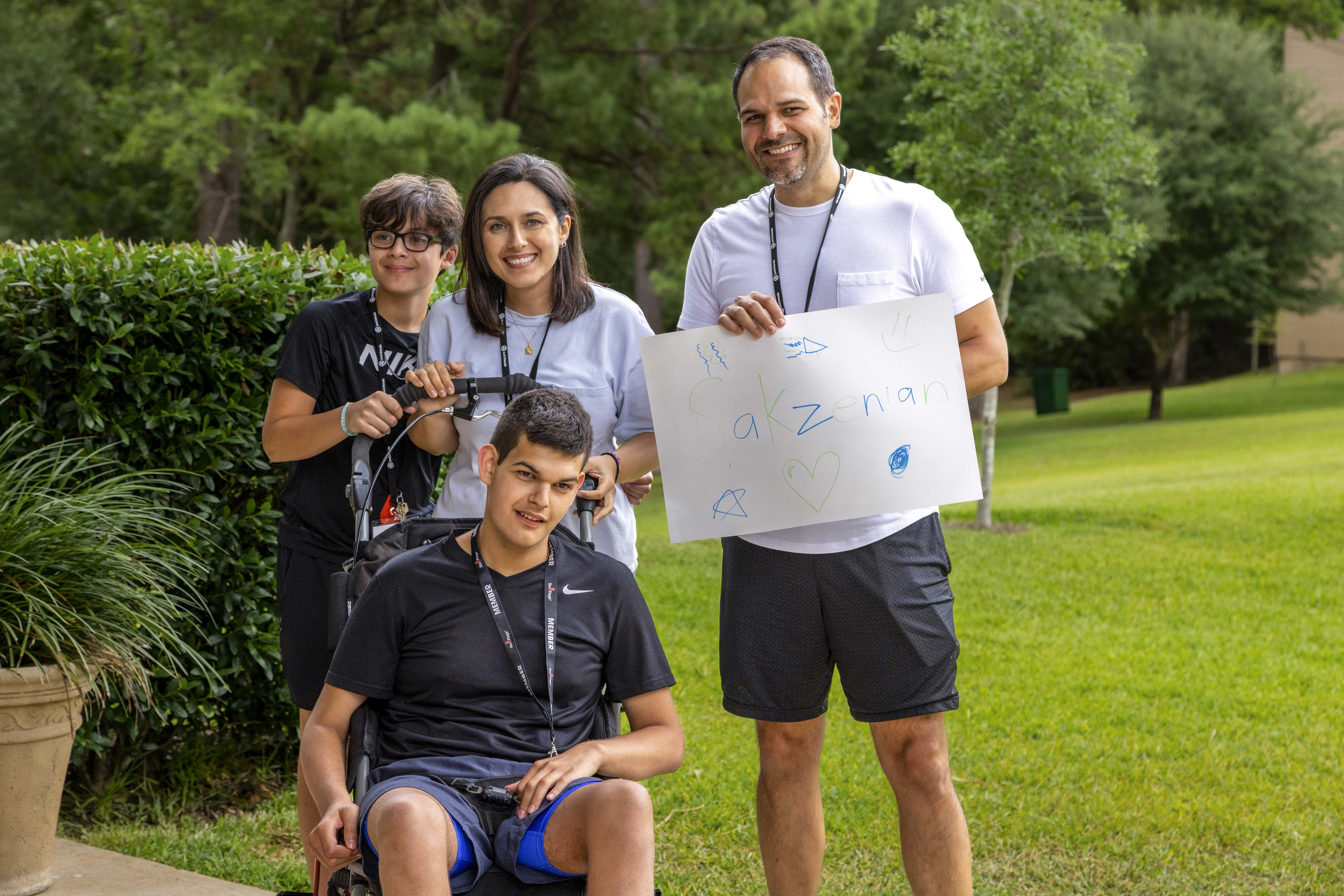 Isaac all grown up with his family at Family Retreat.