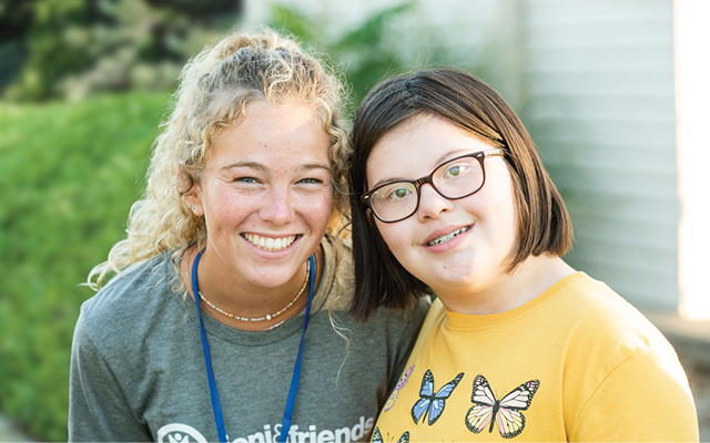 A volunteer and camper at Family Retreat