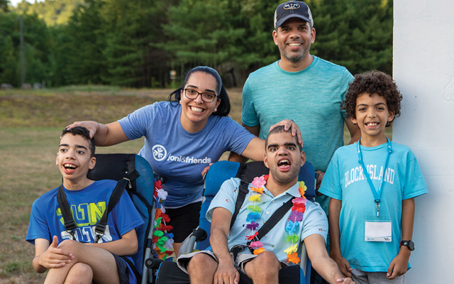 A family poses for a photo at Family Retreat