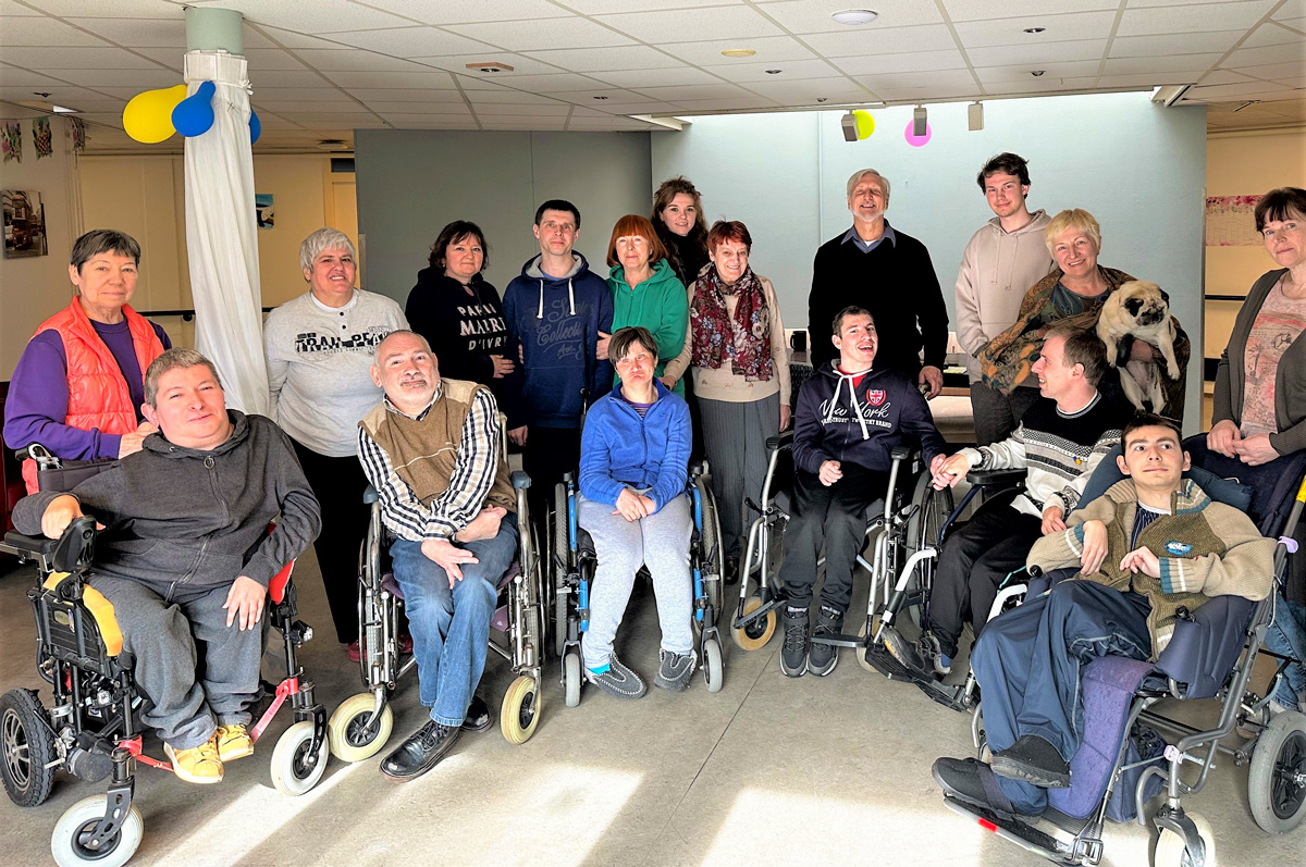 Group photo of Mark with our Joni and Friends partners in Ukraine along with those being served there. Many are wheelchair users.