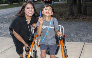 A volunteer and child at a respite event