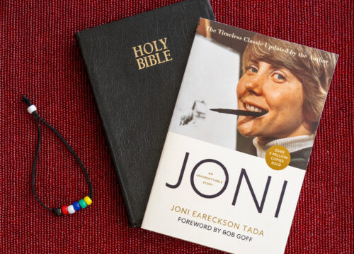 The evangelism kit includes a Gospel bracelet, a Bible, and Joni's autobiography.