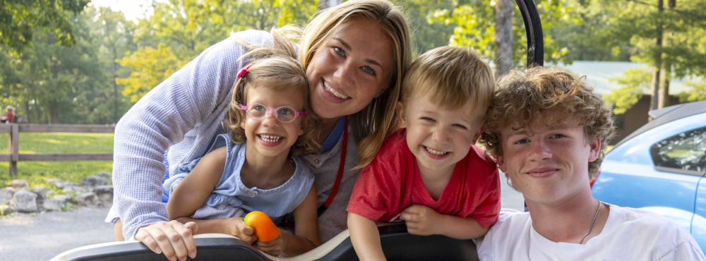 A Family poses for a photo at Family Retreat