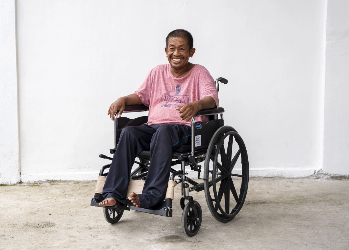 Ramil in his wheelchair