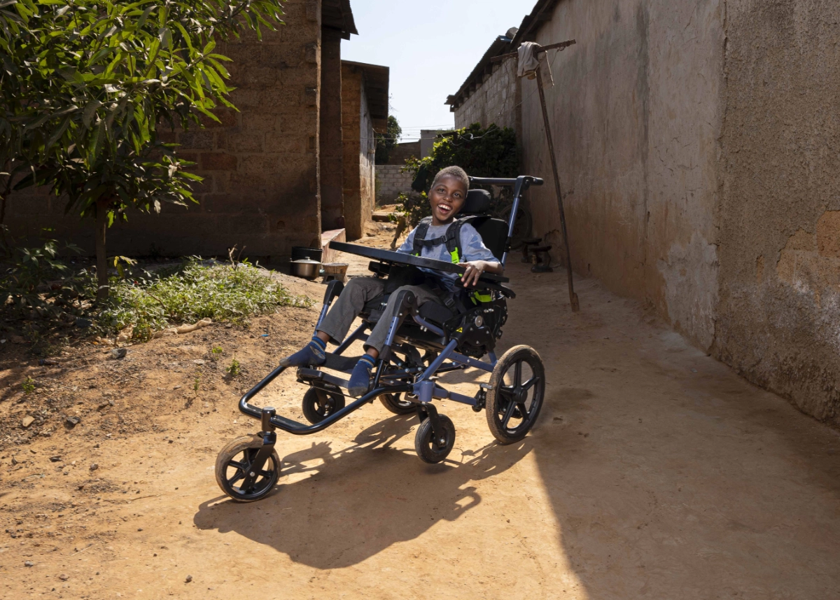 Chisomo in his wheelchair