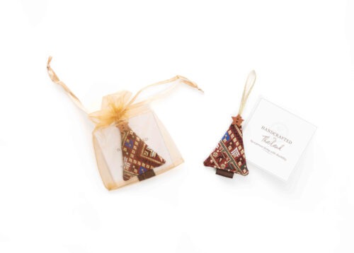Christmas tree shaped ornament with a bag and note