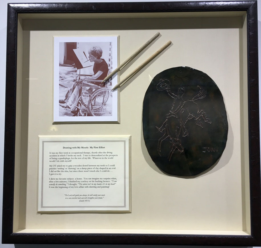 Joni's clay art cowboy on a bucking horse