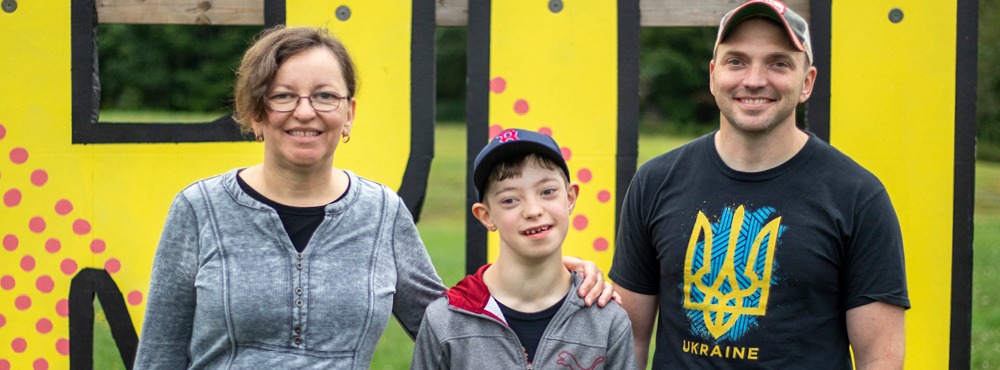 A family poses for a photo at Family Retreat