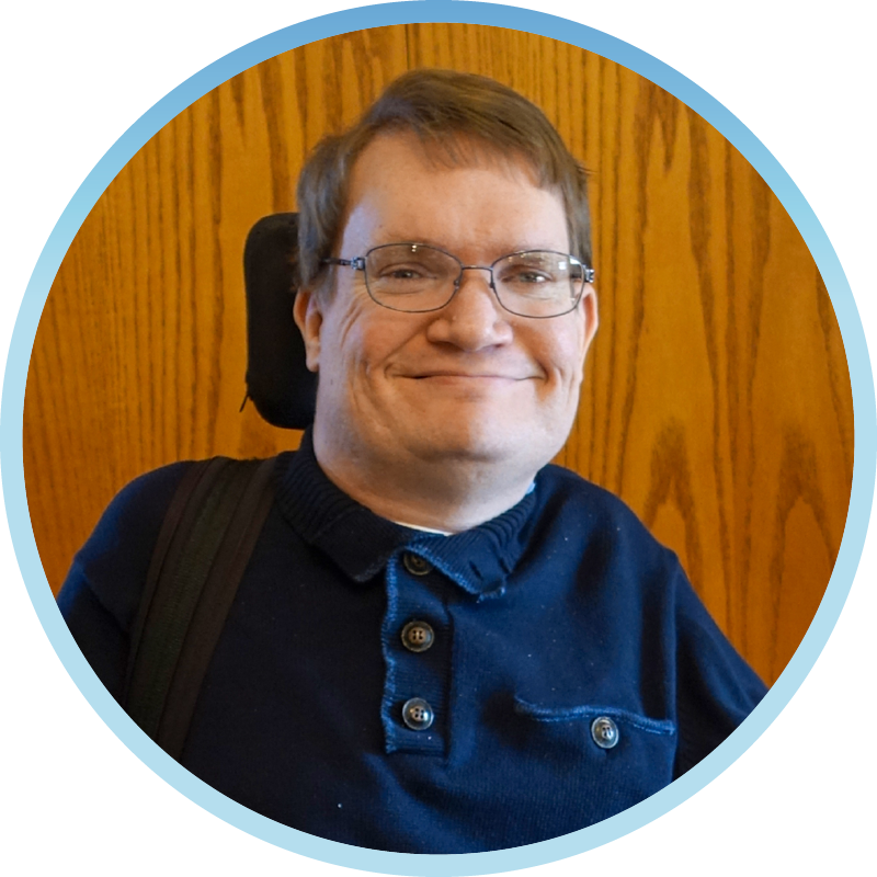 A headshot of Pastor Joel Vander Molen smiling at the camera.
