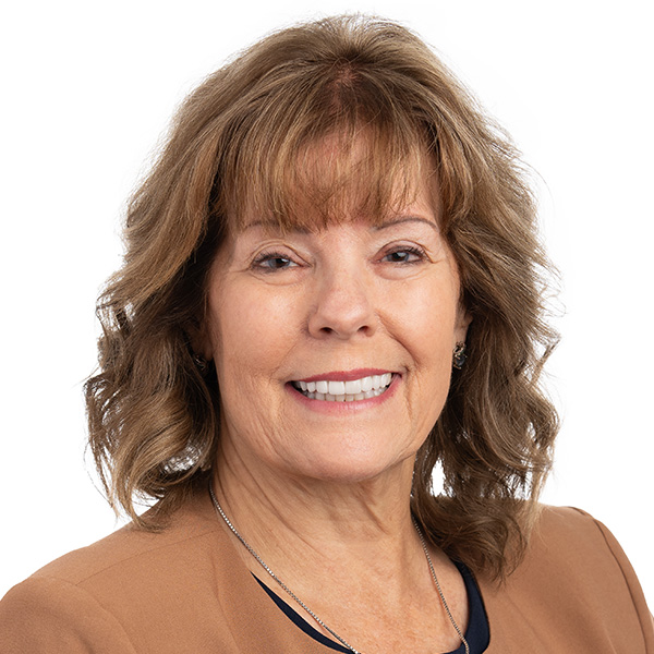 A headshot of Mary Perdue smiling for the camera.