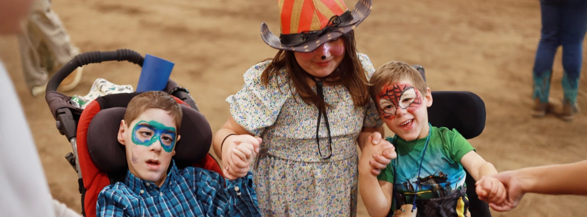 A group of children with their faces painted