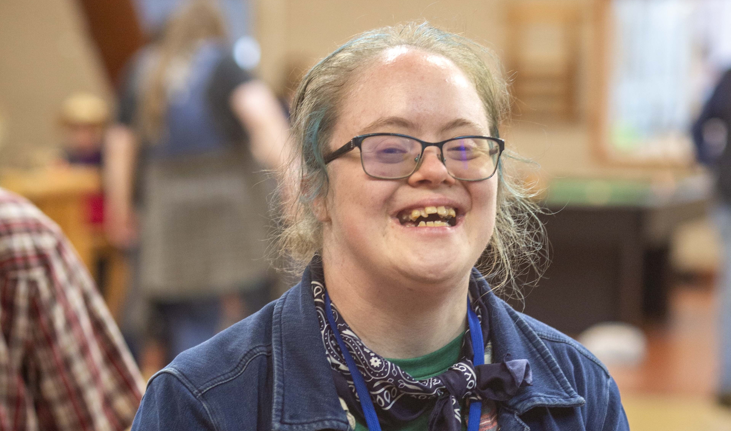 Emily Satterberg smiling and having fun while posing for the camera during Family Retreat.