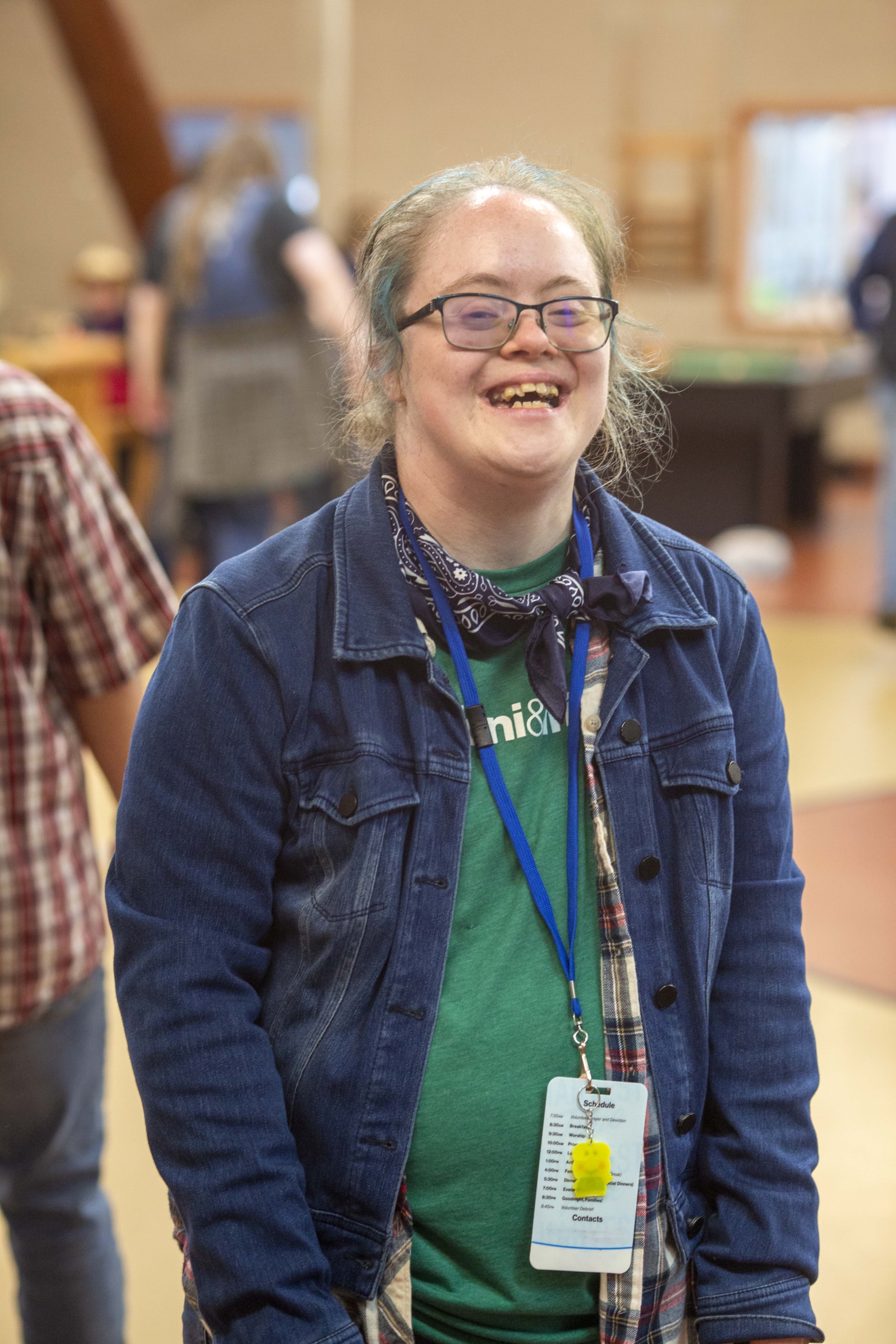 Emily Satterberg smiling and having fun while posing for the camera during Family Retreat.