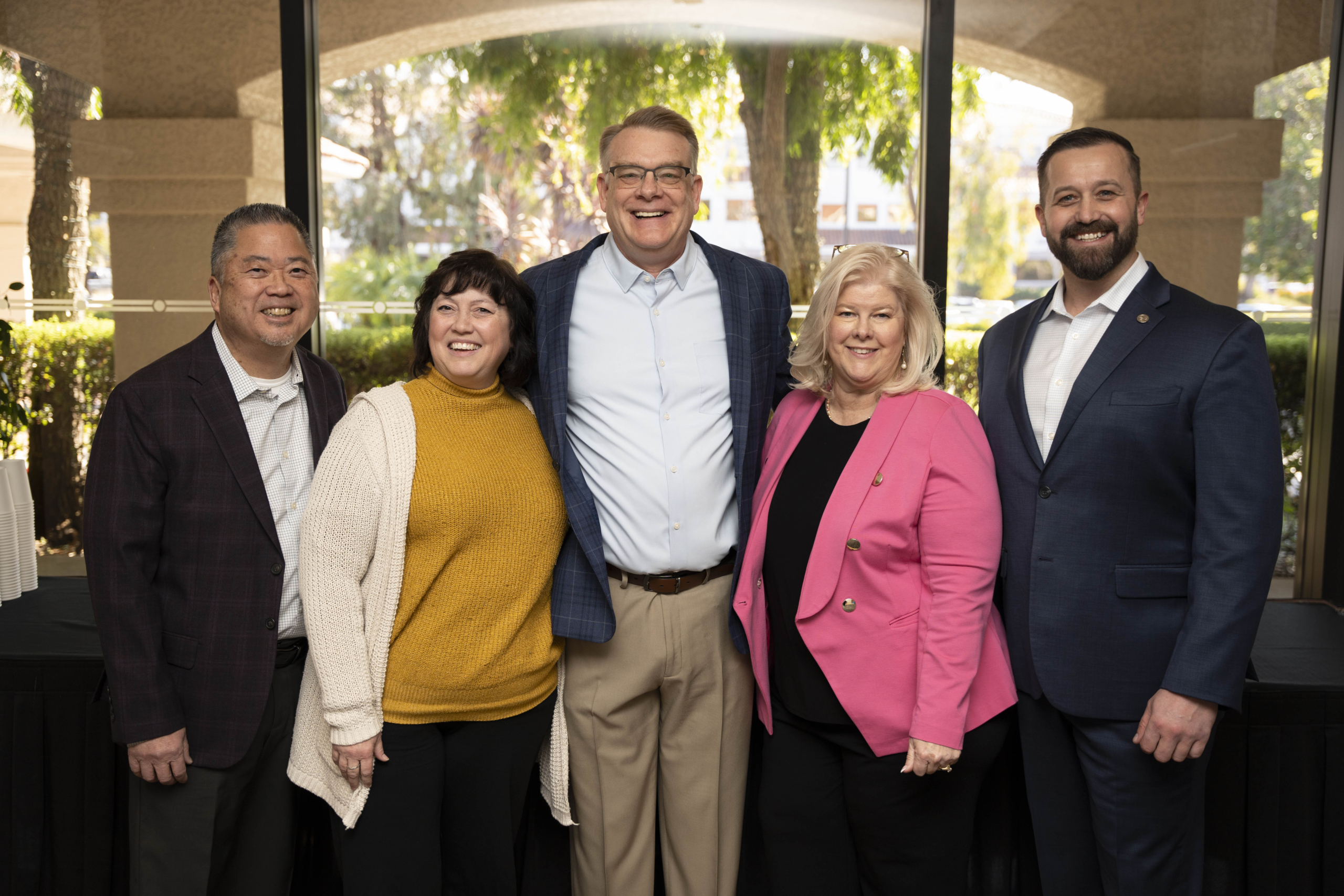 Shawn Thornton with Joni and Friends' executive team, including Christopher Sue (CFO), Donna Luca (CMO), Jason Holden (COO), and another guest.