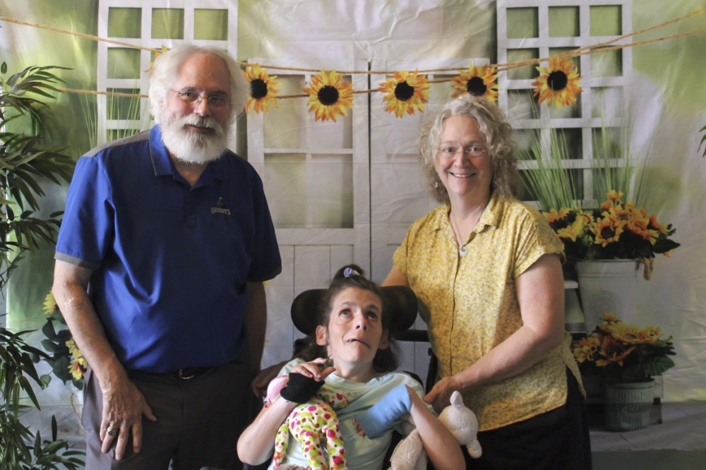 A family poses for a photo at Family Retreat