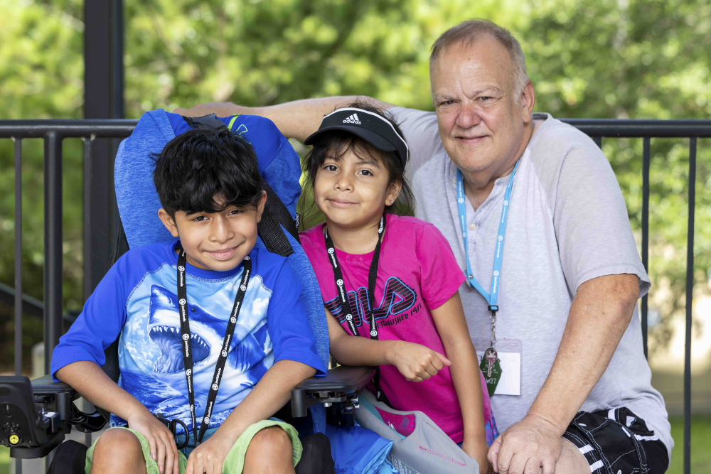 Campers pose for a photo at Family Retreat
