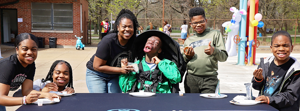 A family poses for a photo at a Joni and Friends event