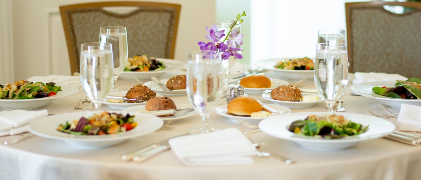 A table prepared with dinnerware