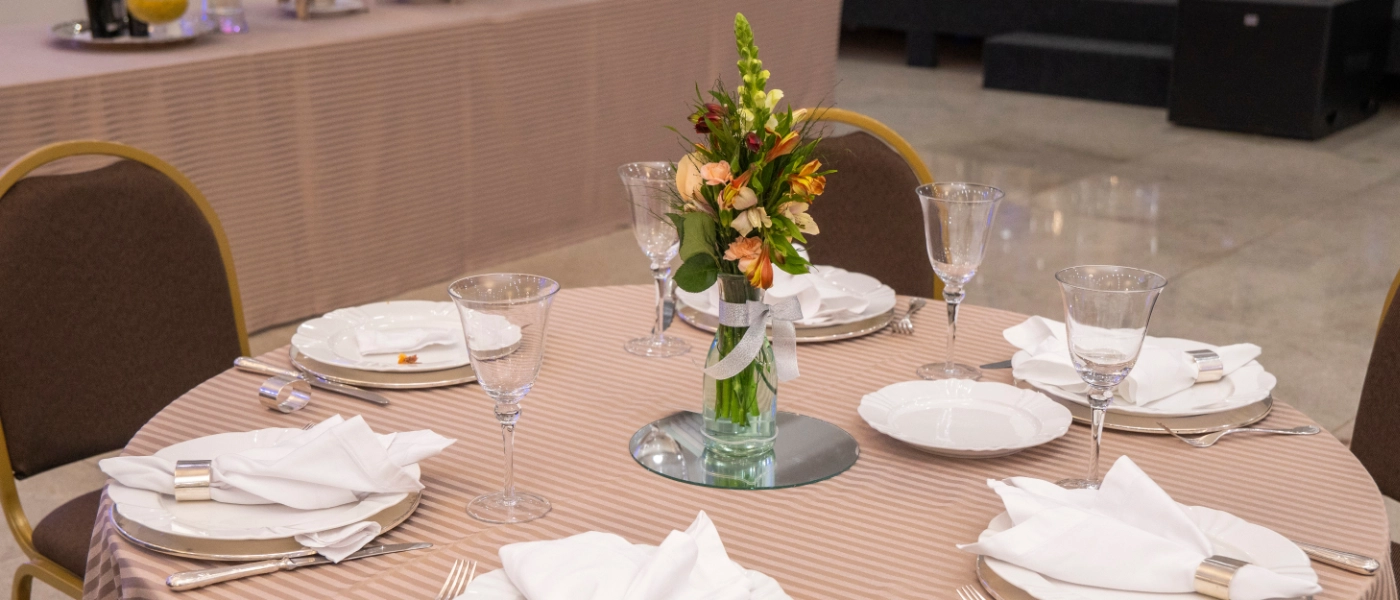 A table prepared with dinnerware
